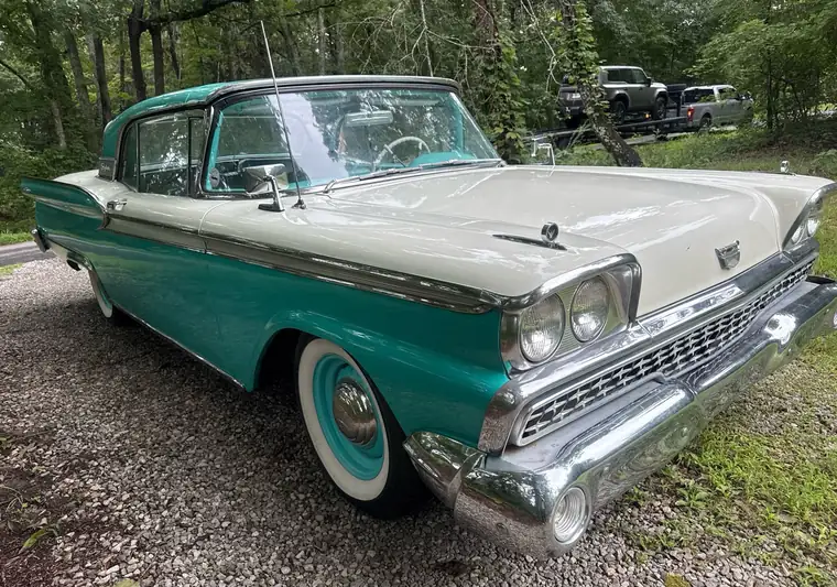 The same 1959 classic car on a gravel driveway at delivery in Bon Aqua, Tennessee