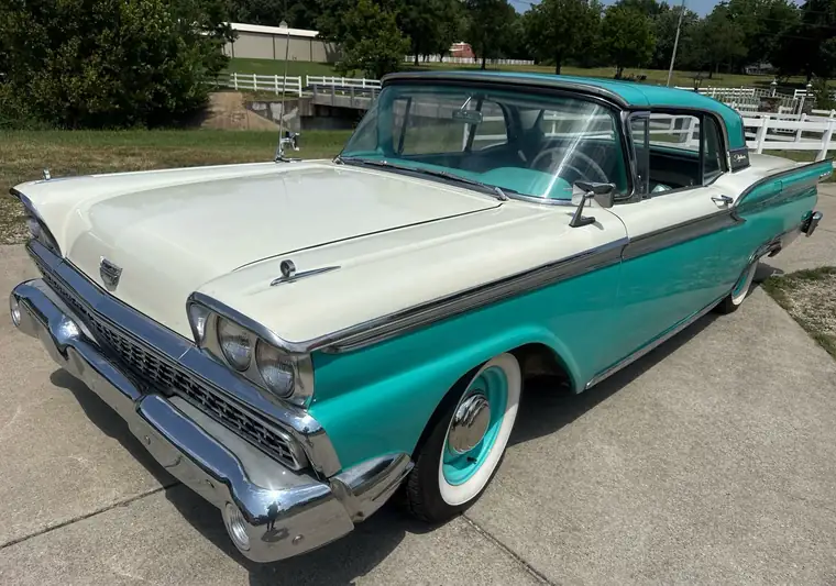 Turquoise and white 1959 two-door classic car at pickup in Springdale, Arkansas