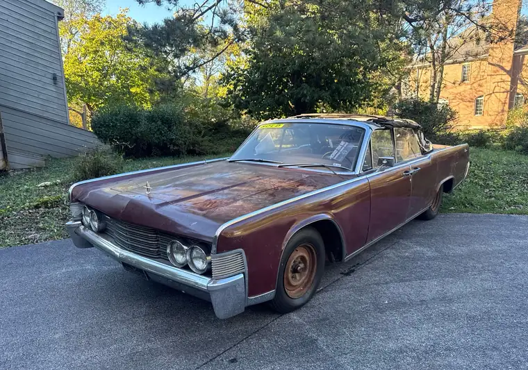 The same Lincoln Continental parked on a driveway at delivery in Flossmoor, Illinois