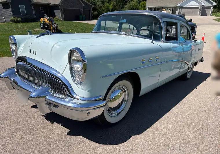 The same 1954 Buick Special on a driveway at delivery in Roscoe, Illinois