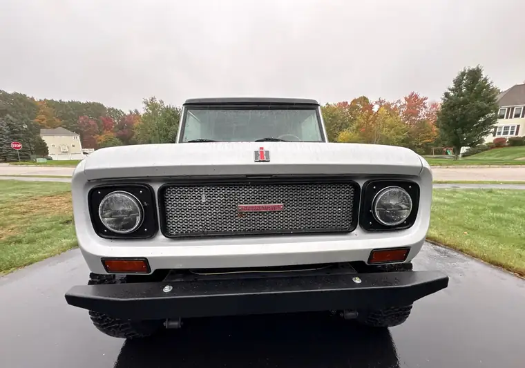 The same International Scout on a wet driveway at delivery in Dover, New Hampshire