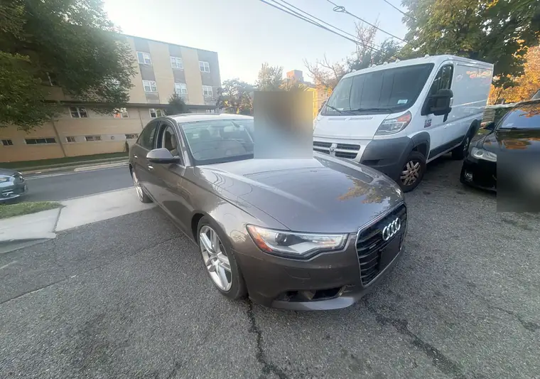 The same Audi A6 on a street at delivery in Washington, DC