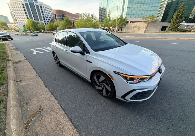 The same Golf GTI on a street at delivery in McLean, Virginia
