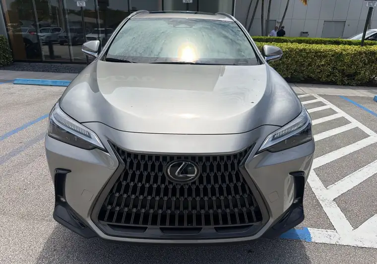 Front of a gray 2024 Lexus SUV at pickup at a dealership in Delray Beach, Florida