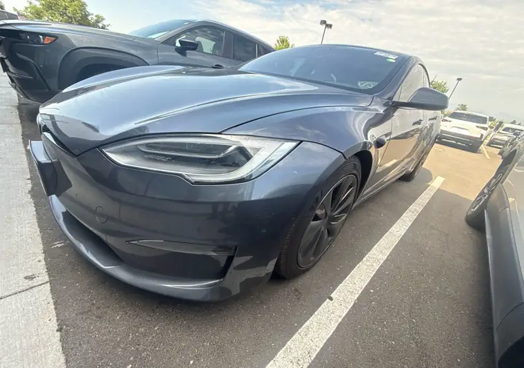 The same Tesla Model S in a parking lot at delivery in Loveland, Colorado