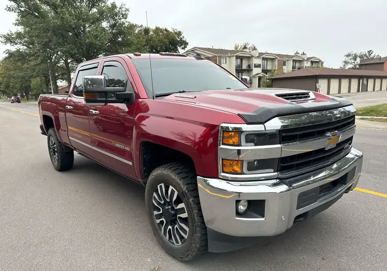 The same Silverado 2500HD on a street at delivery in Lincoln, Nebraska