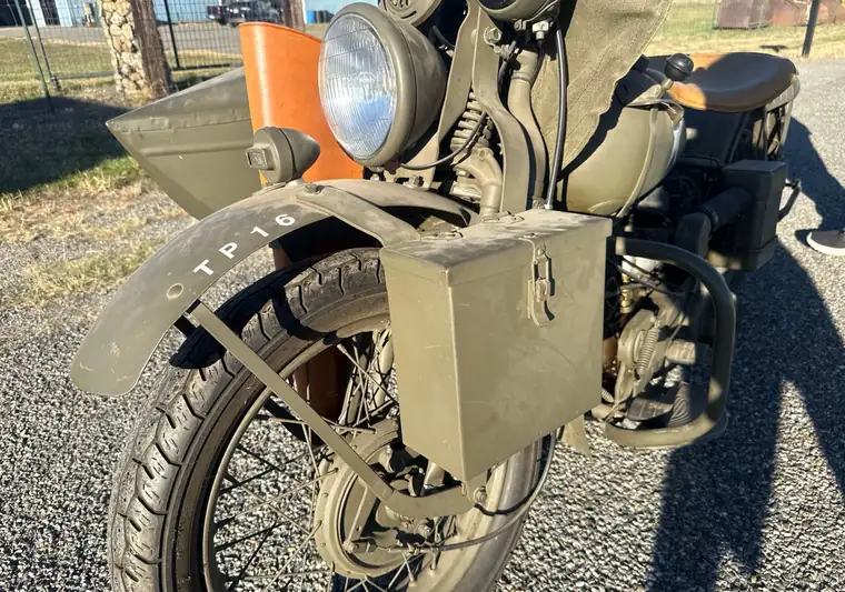 Olive-drab 1942 Harley-Davidson WLA military motorcycle with sidecar at pickup in Rathdrum, Idaho