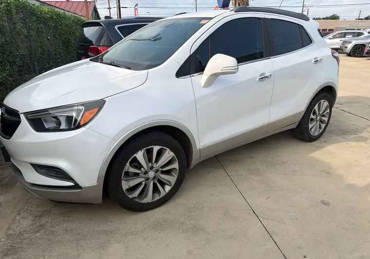 The same Buick Encore on a driveway at delivery in San Antonio, Texas