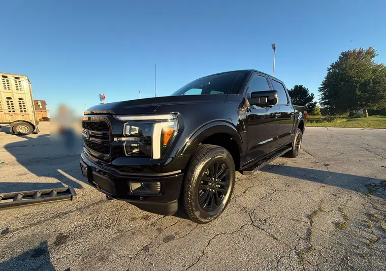 The same Ford F-150 on a parking lot at delivery in Abrams, Wisconsin