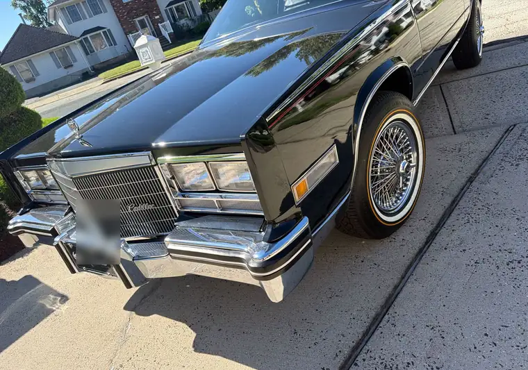 The same Cadillac Eldorado on a driveway at delivery in Sayreville, New Jersey