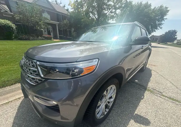Gray 2021 Ford Explorer parked on a residential street in Granger, Indiana