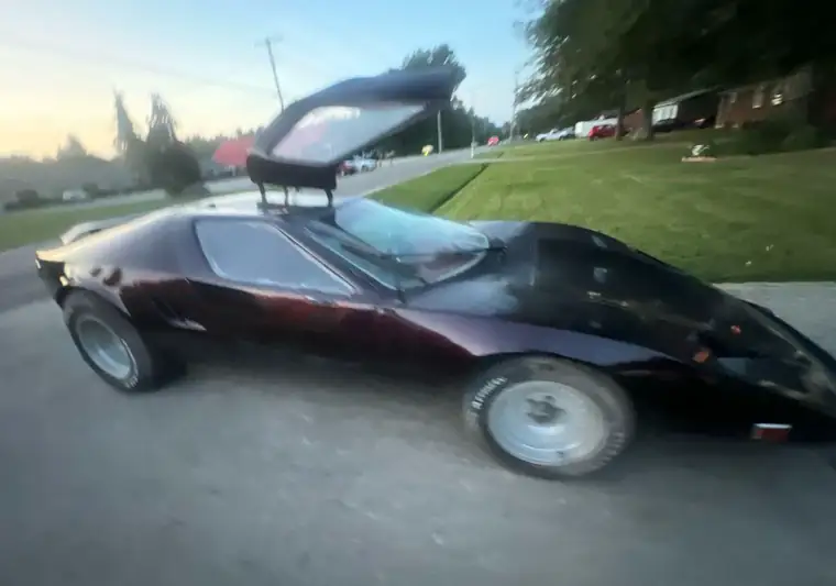 The same Cimbria SS with its door raised on a driveway at delivery in Louisville, Kentucky