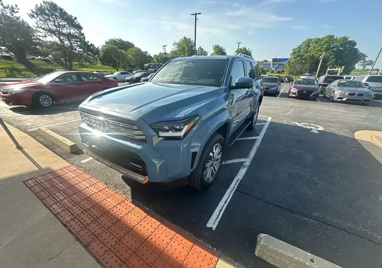Blue 2026 Toyota 4Runner in a parking lot in Mission, Kansas
