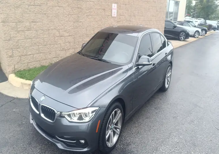 Gray 2018 BMW 328i sedan in a parking lot in Mission, Kansas