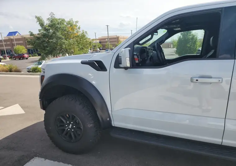 The same Ford F-150 in a parking lot at delivery in Loveland, Colorado