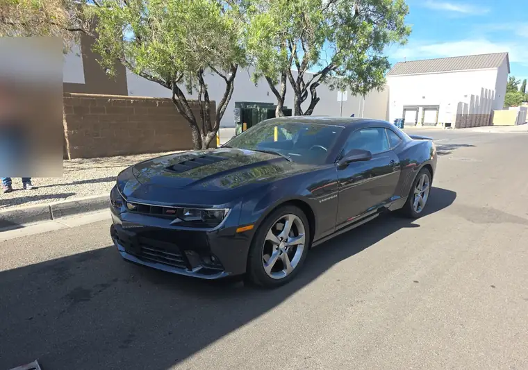 The same Camaro on a street at delivery in Albuquerque, New Mexico