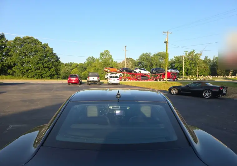 Black 2014 Chevrolet Camaro in a parking lot in Russell Springs, Kentucky