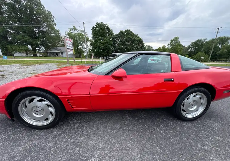 Red 1996 Chevrolet Corvette coupe in a parking lot in Jamestown, Kentucky