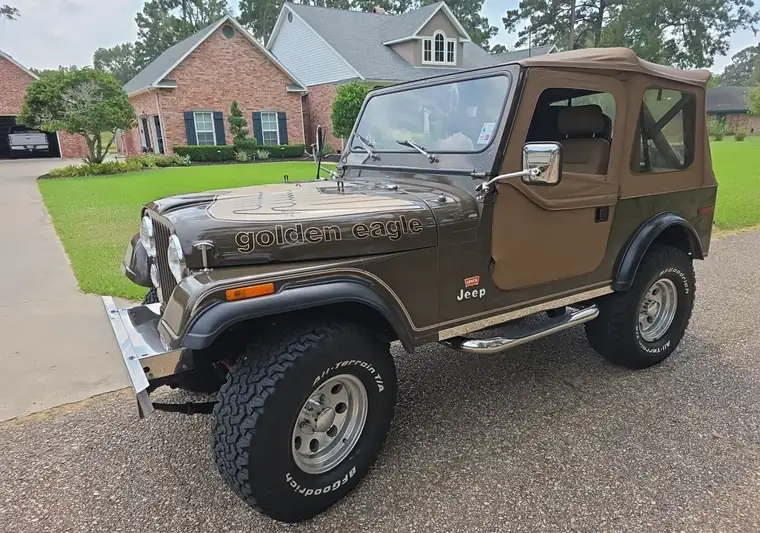 Green 1978 Jeep CJ-7 Golden Eagle with a tan soft top at pickup in Eunice, Louisiana