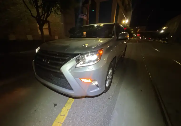Silver 2017 Lexus GX 460 at night at pickup in New Orleans, Louisiana