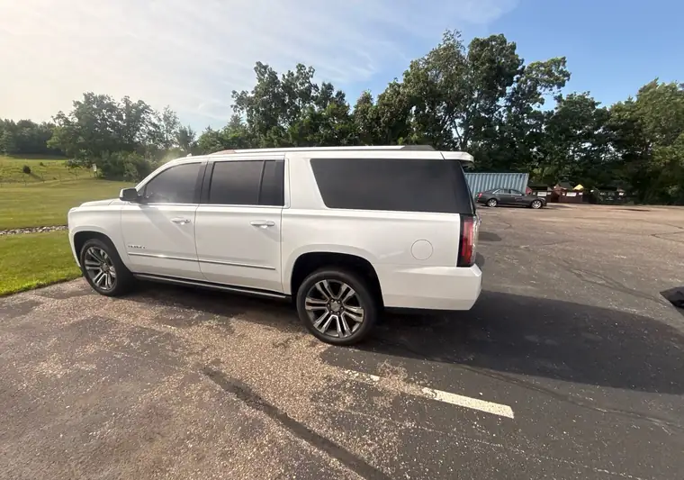 White 2020 GMC Yukon XL Denali on a lot at pickup in Baraboo, Wisconsin