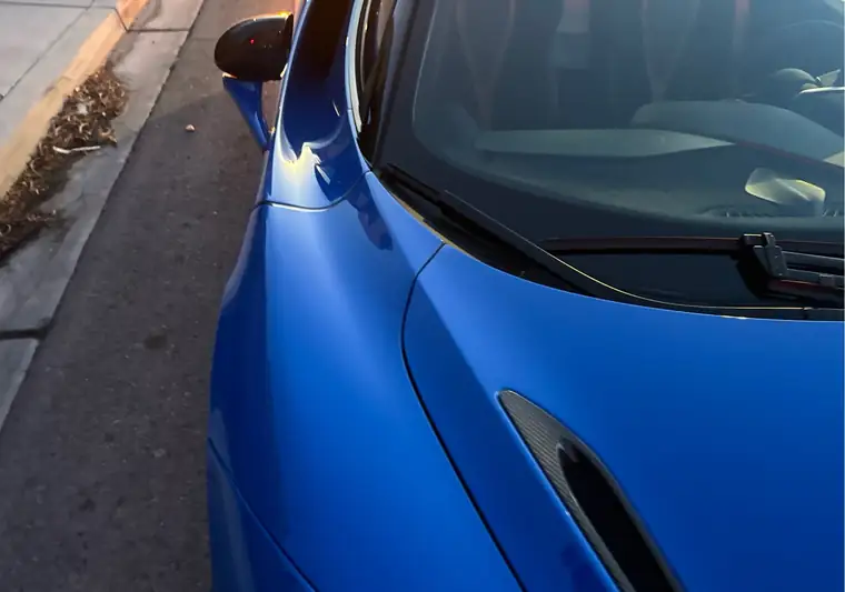 The same McLaren 720S on a street at delivery in Henderson, Nevada