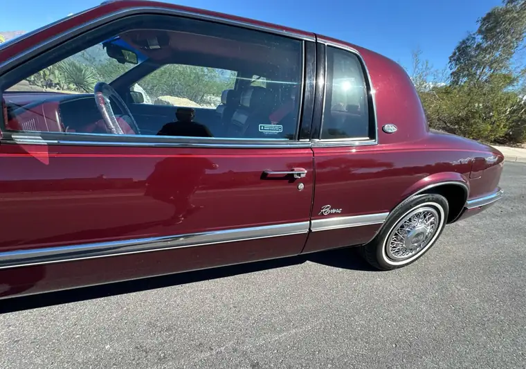 The same Buick Riviera with wire wheels at delivery in Tucson, Arizona