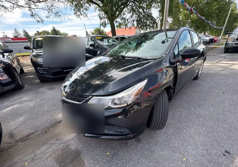 The same Cruze in a dealer lot at delivery in Herkimer, New York