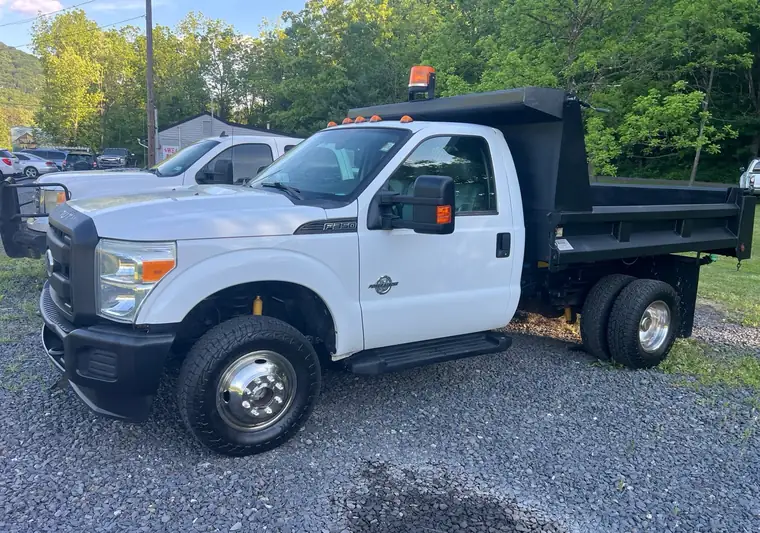 The same F-350 dump truck on a gravel lot at delivery in Paxinos, Pennsylvania