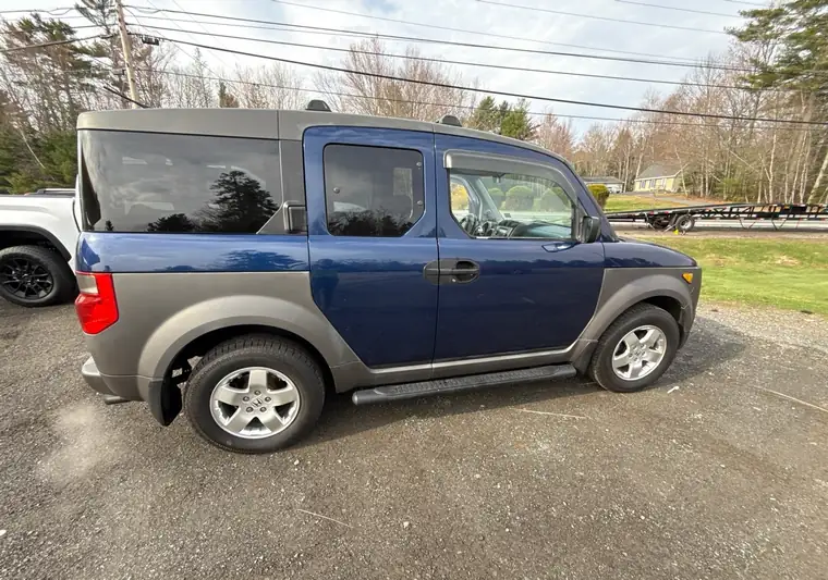 The same Honda Element on a gravel lot at delivery in Orland, Maine