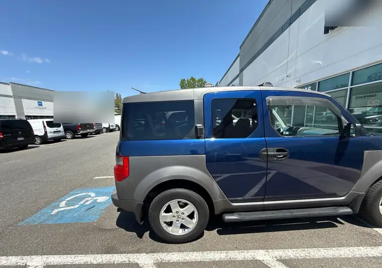 Blue and gray 2003 Honda Element in a parking lot in Chantilly, Virginia