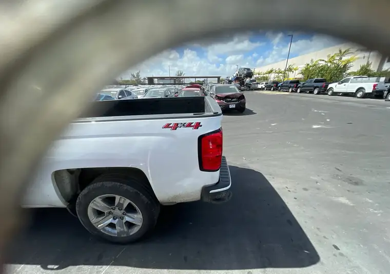 The same Silverado 1500 in a parking lot at delivery in Medley, Florida