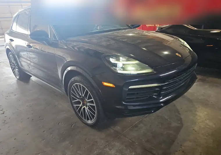 Dark blue 2020 Porsche Cayenne in a service garage in Minnetrista, Minnesota