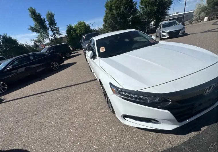 The same Accord in a lot at delivery in Denver, Colorado