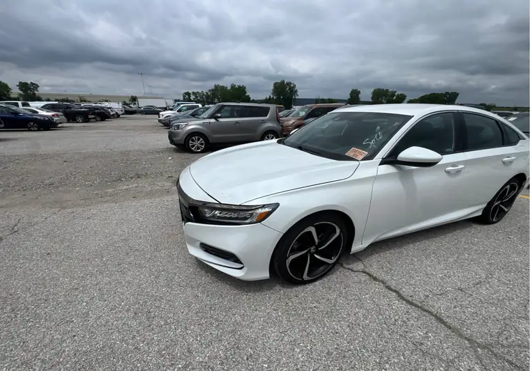 White 2020 Honda Accord in a large parking lot at pickup in Bridgeton, Missouri
