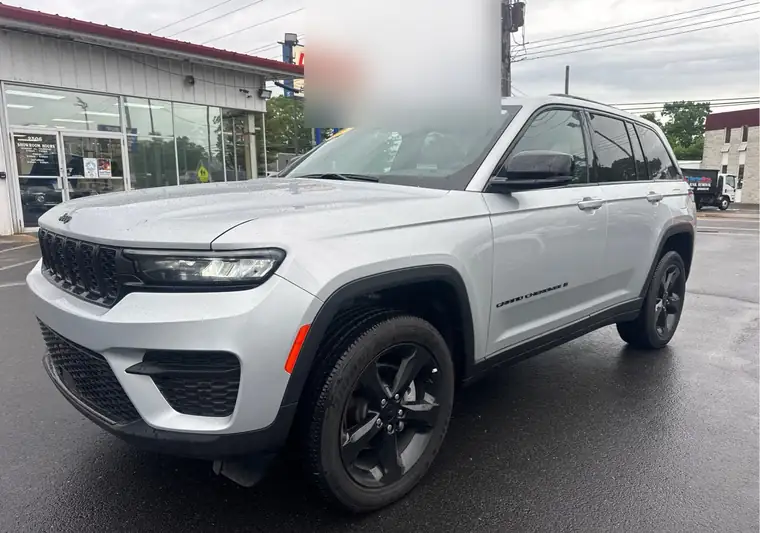 The same Grand Cherokee at a dealership lot at delivery in Point Pleasant, New Jersey