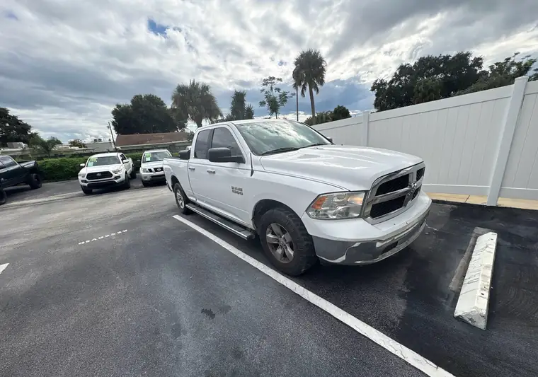 The same Ram 1500 in a parking lot at delivery in Cocoa, Florida