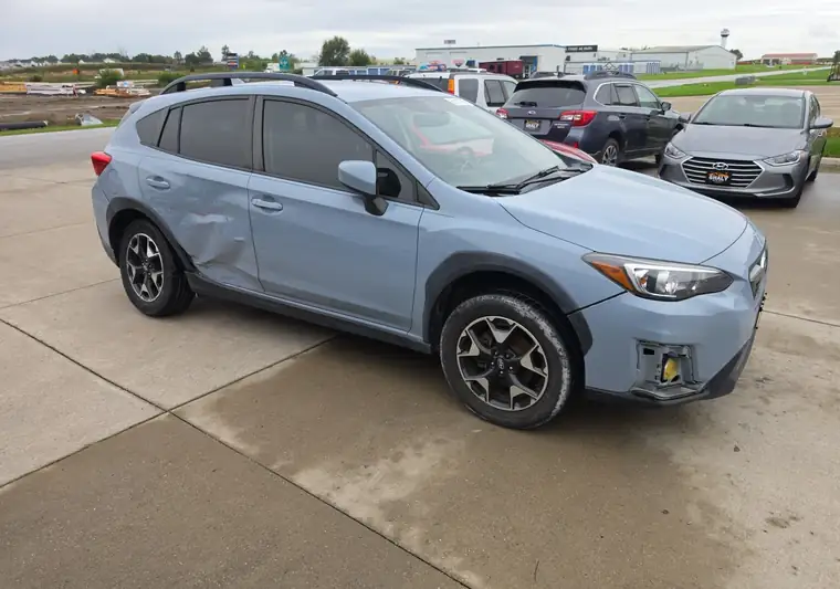 The same Crosstrek in a parking lot at delivery in De Soto, Iowa