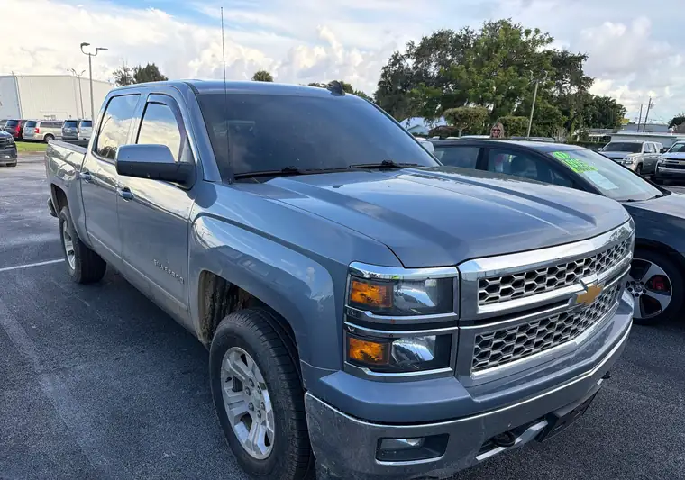 The same Silverado in a parking lot at delivery in Cocoa, Florida
