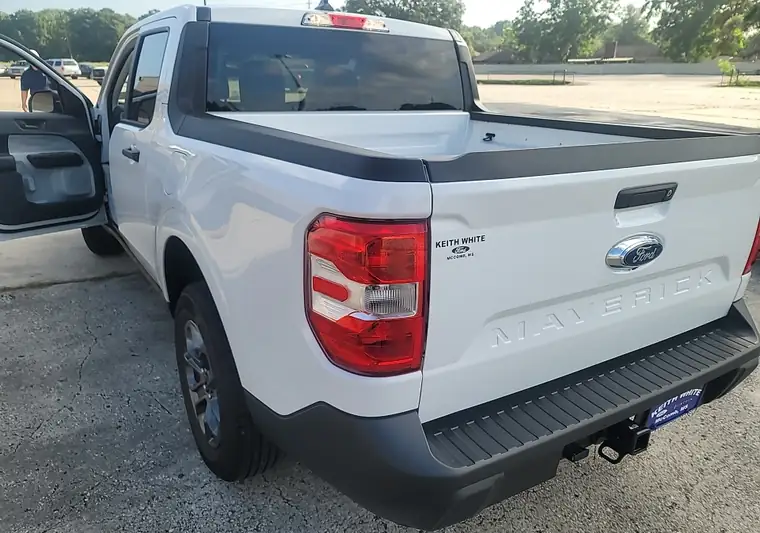 The same Maverick in a parking lot at delivery in Houston, Texas