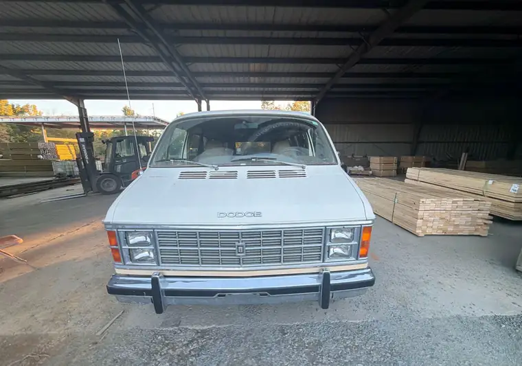 Cream and tan 1979 Dodge Ram van under a shed at pickup in Mount Gilead, North Carolina