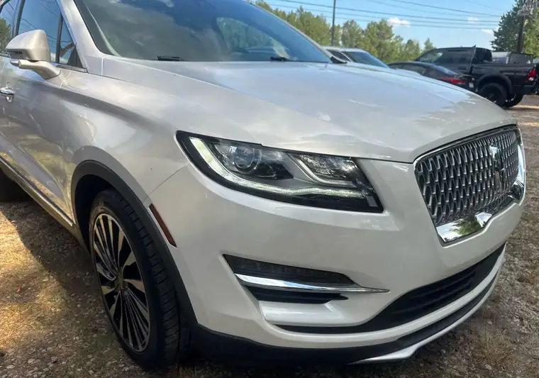 White 2019 Lincoln MKC SUV at pickup at a dealer in Raleigh, North Carolina
