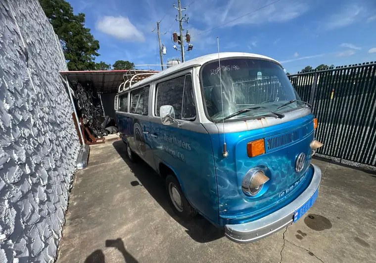 The same Volkswagen bus in a parking lot at delivery in Fayetteville, North Carolina