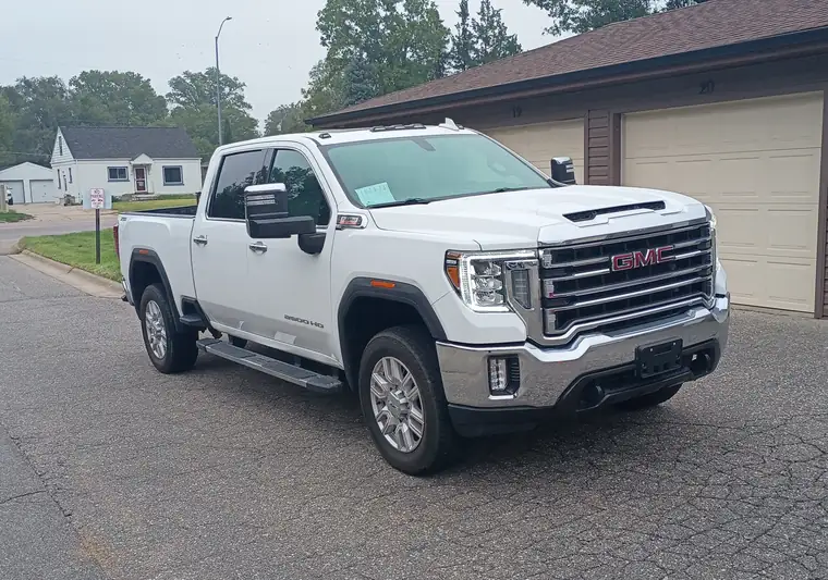 White 2023 GMC Sierra 2500HD crew cab at pickup in Lincoln, Nebraska