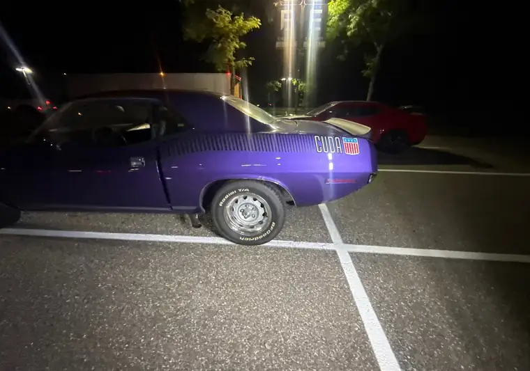 The same Cuda at night in a parking lot at delivery in Northport, New York