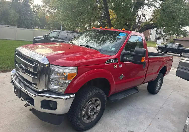 The same F-350 on a driveway at delivery in Lincoln, Nebraska