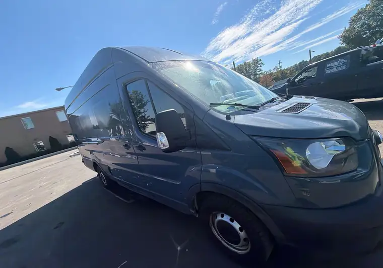 Gray-blue 2020 Ford Transit T-250 high-roof cargo van at the Copart yard in Glassboro, New Jersey