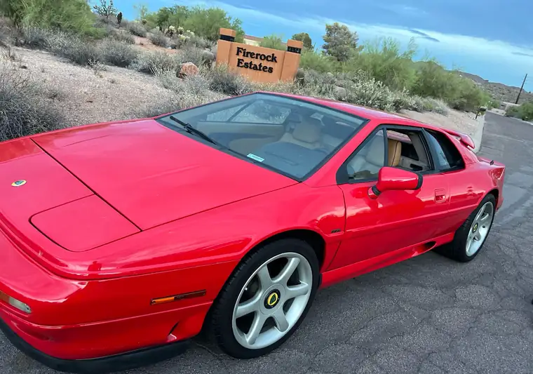 The same red Lotus Esprit with its rear wing at delivery in Fountain Hills, Arizona