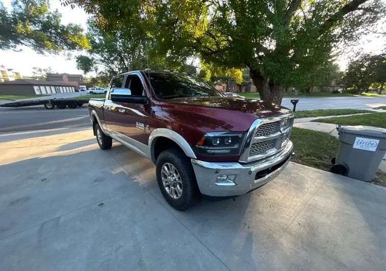 The same Ram 2500 on a concrete driveway at delivery in Lincoln, Nebraska