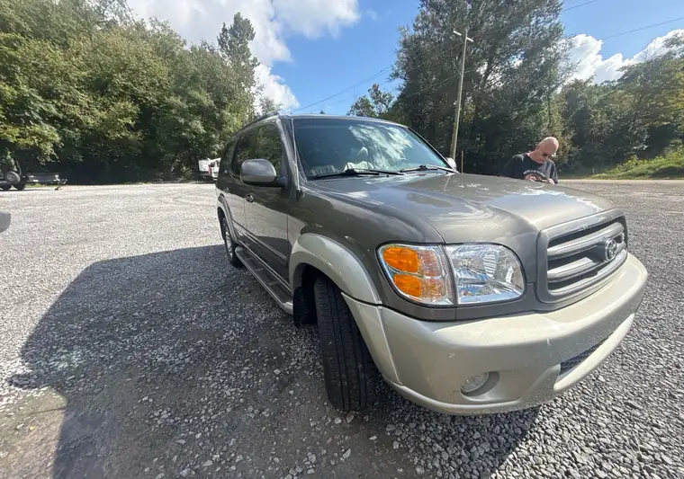 The same Toyota Sequoia in daylight on a gravel lot at delivery in Morgantown, West Virginia